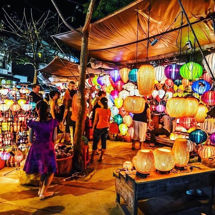 a market scene in the old quarter hanoi