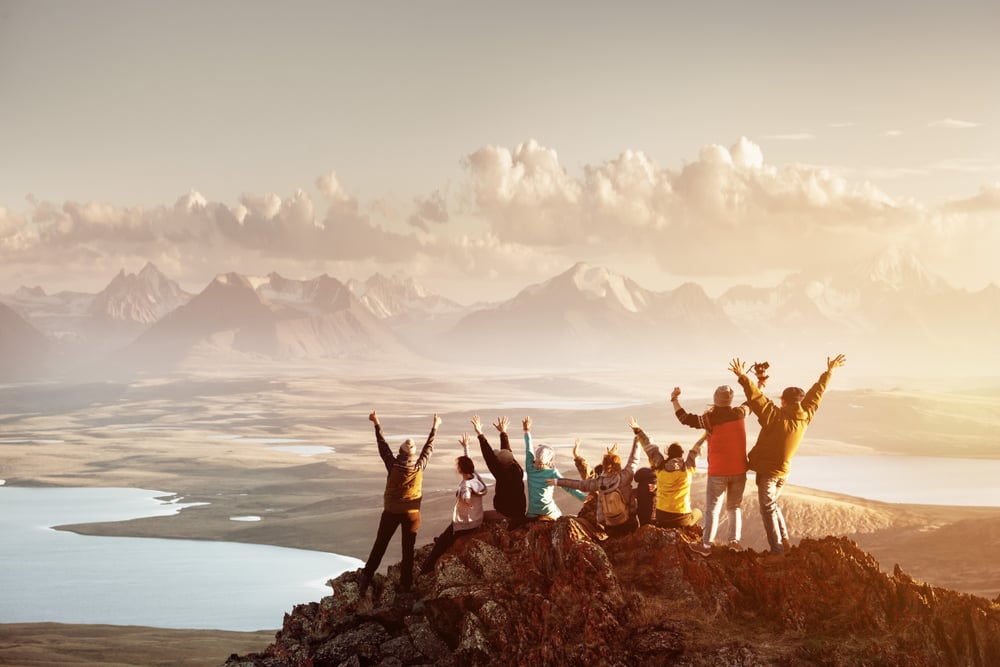 Ground of friends on top of a mountain
