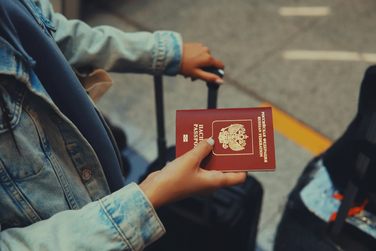 Traveller checking booking conditions on a mobile device